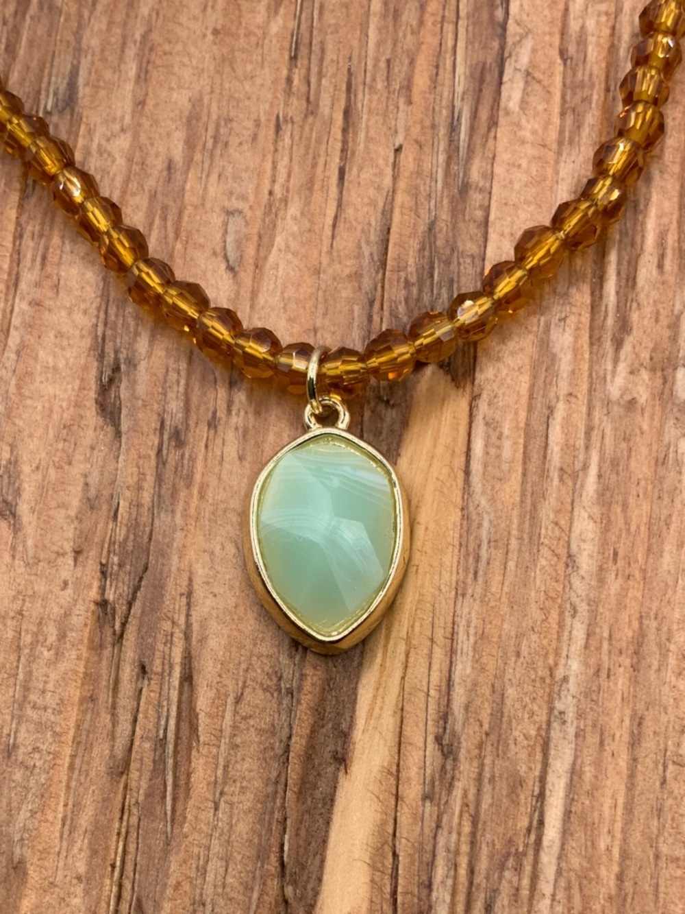 Plunder Design Light Green Faceted Gold Tone Pendant Beaded Necklace